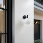 Lucande Dangan outdoor wall light, black/white, Ø 8 in, glass