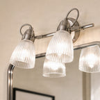 Lucande Kara bathroom wall light, 12 in, 2-bulb, glass, metal