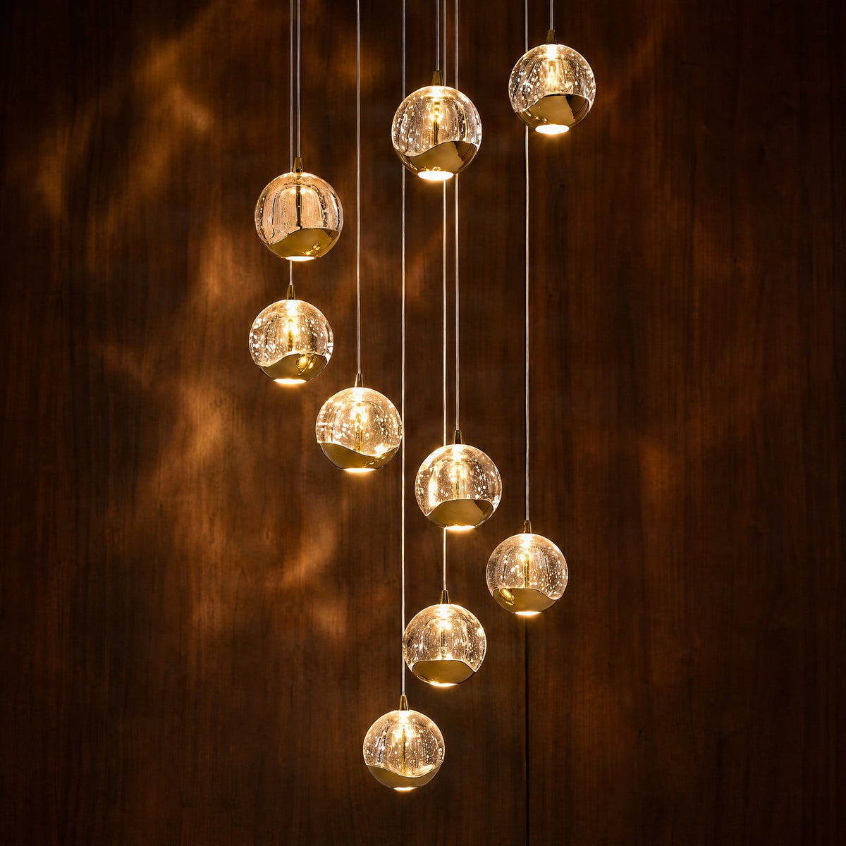 Lucande Hayley LED hanging light, Ø 15.7 inches, 9-bulb, gold, glass