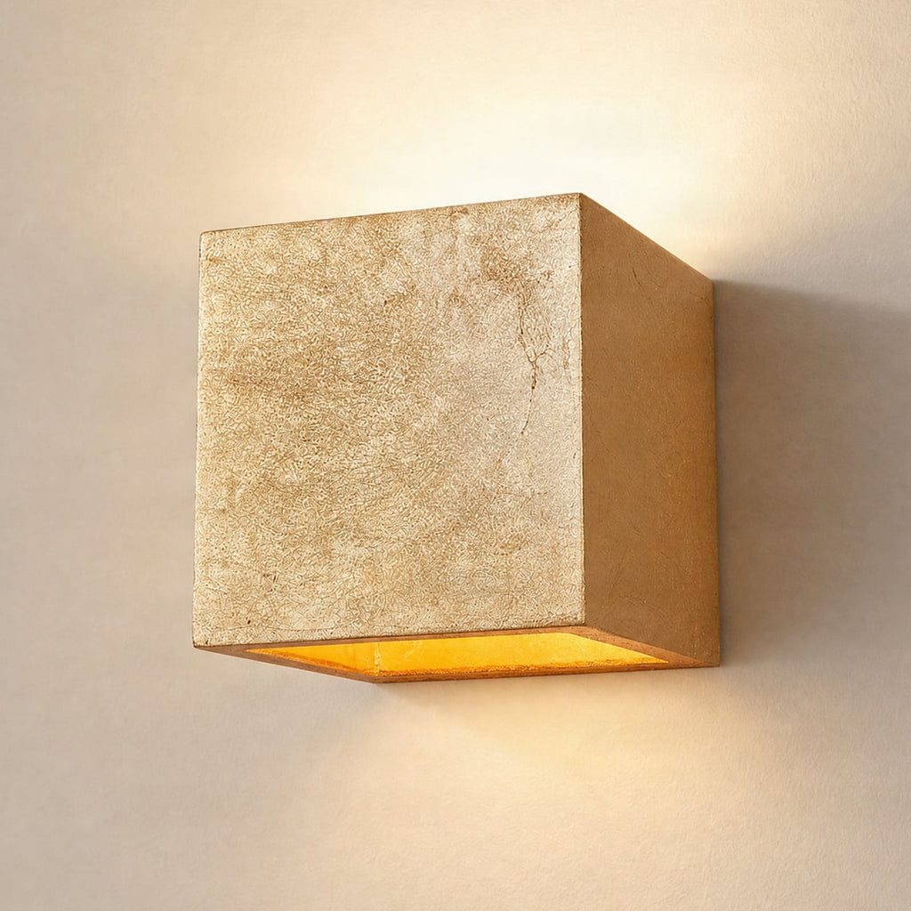 Lucande Yade wall light, width 4.5 in, gold, plaster