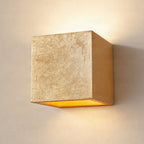 Lucande Yade wall light, width 4.5 in, gold, plaster