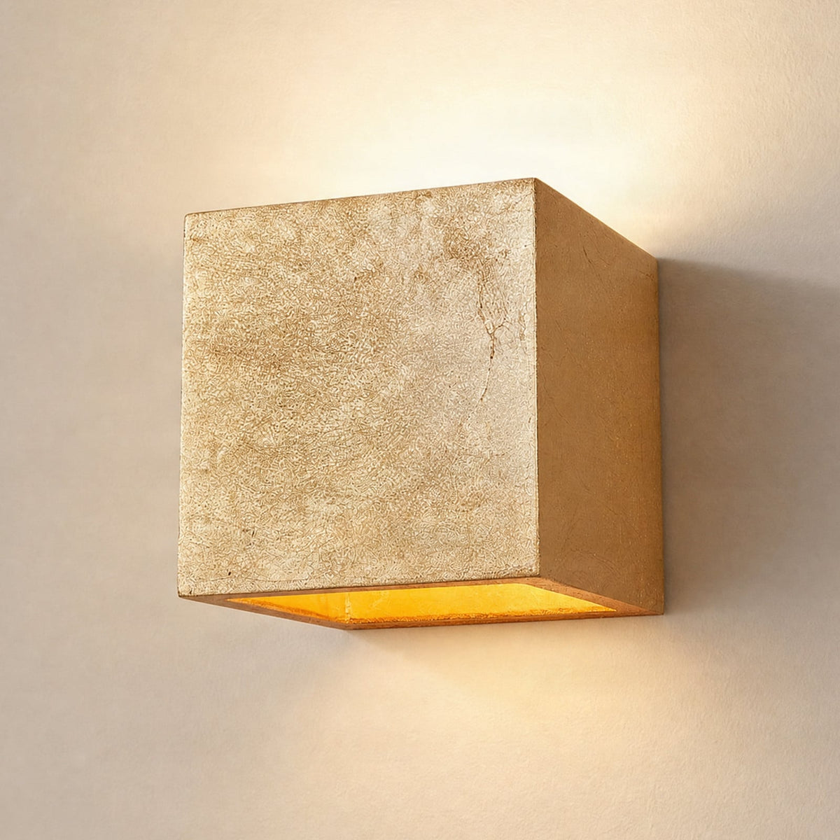 Lucande Yade wall light, width 4.5 in, gold, plaster