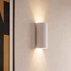 Lucande Colja wall light, round, height 7 in, plaster, white