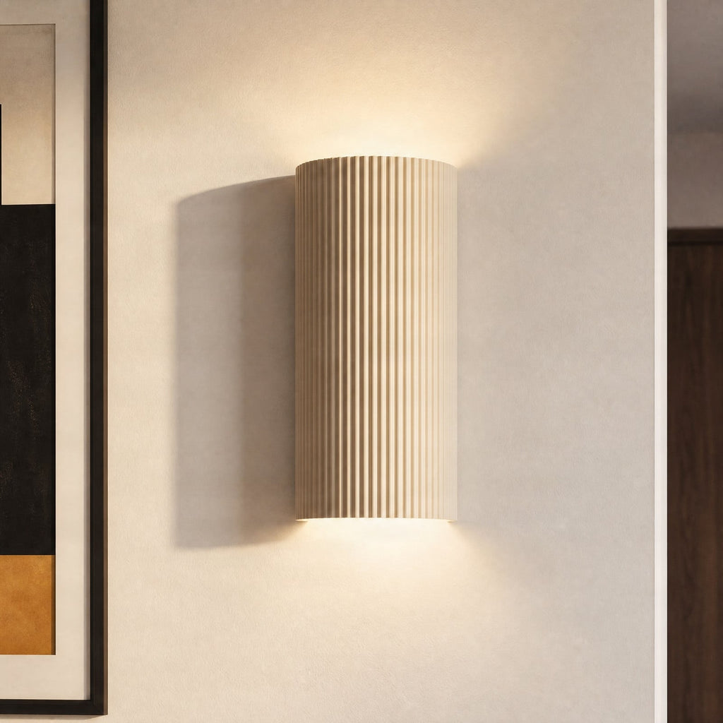 Lucande Colja wall light, round, height 12 in, plaster, beige