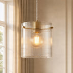 Lucande Carlie pendant light, 1-bulb, brass/clear, 7.87 in