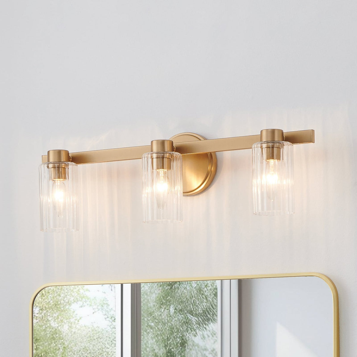 Thesis Bedminster bathroom wall lamp, gold, 3-bulb, 24 in, metal