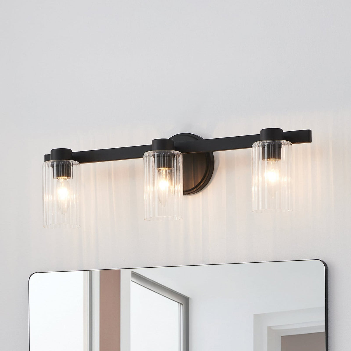 Thesis Bedminster bathroom wall lamp, black, 3-bulb, 24 in, metal