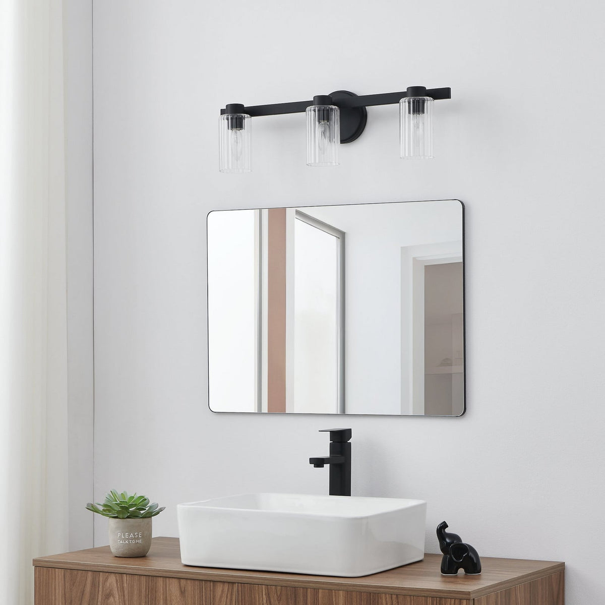 Thesis Bedminster bathroom wall lamp, black, 3-bulb, 24 in, metal
