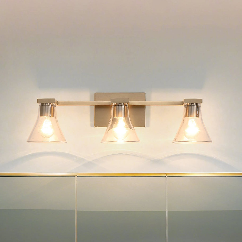 Thesis Gilford bathroom wall lamp, 3-bulb, 24 in, gold-coloured