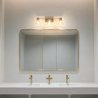 Thesis Gilford bathroom wall lamp, 3-bulb, 24 in, gold-coloured