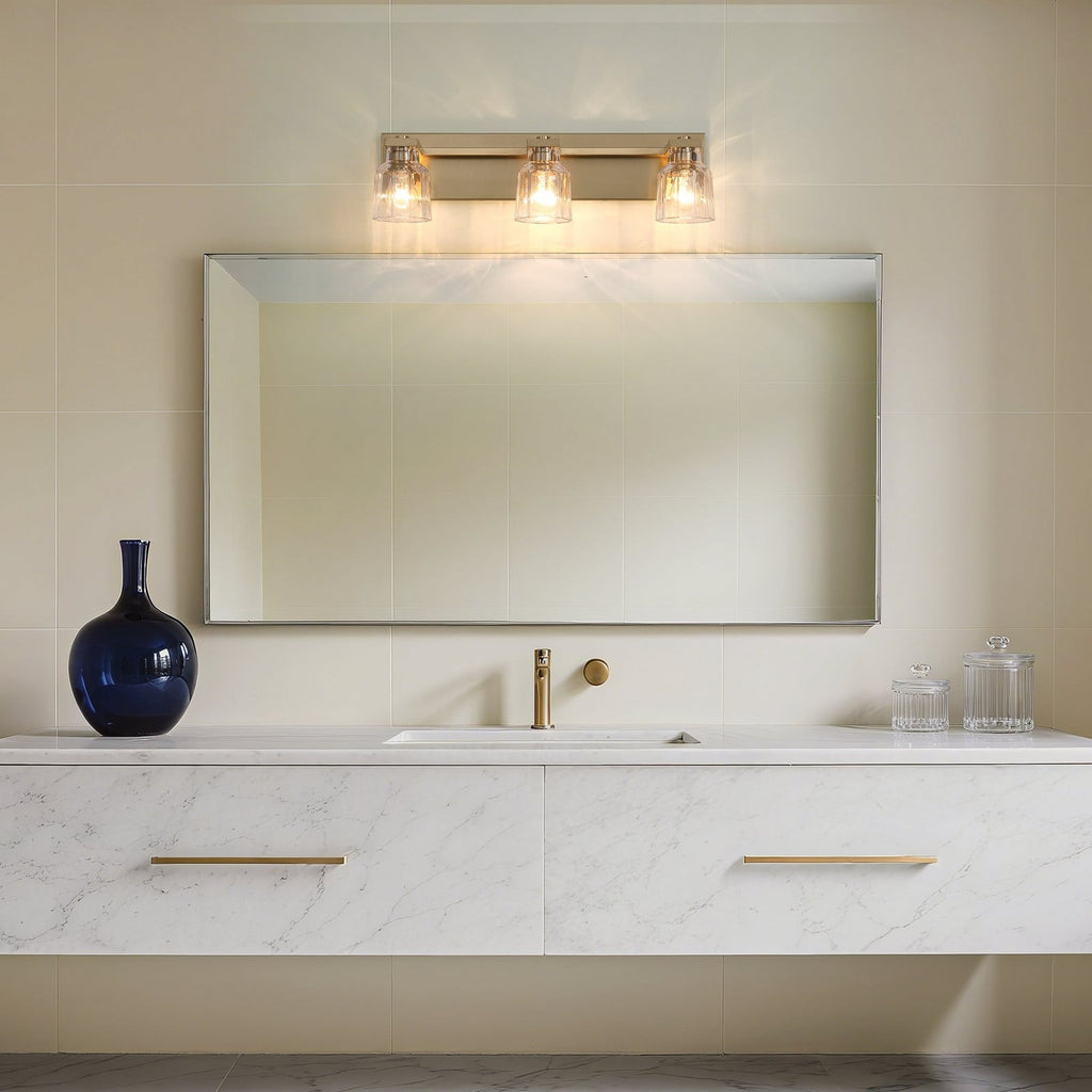 Thesis Dryden bathroom wall lamp, gold, 3-bulb, 24 in, metal/glass