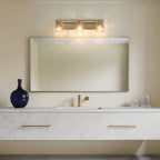 Thesis Dryden bathroom wall lamp, gold, 3-bulb, 24 in, metal/glass