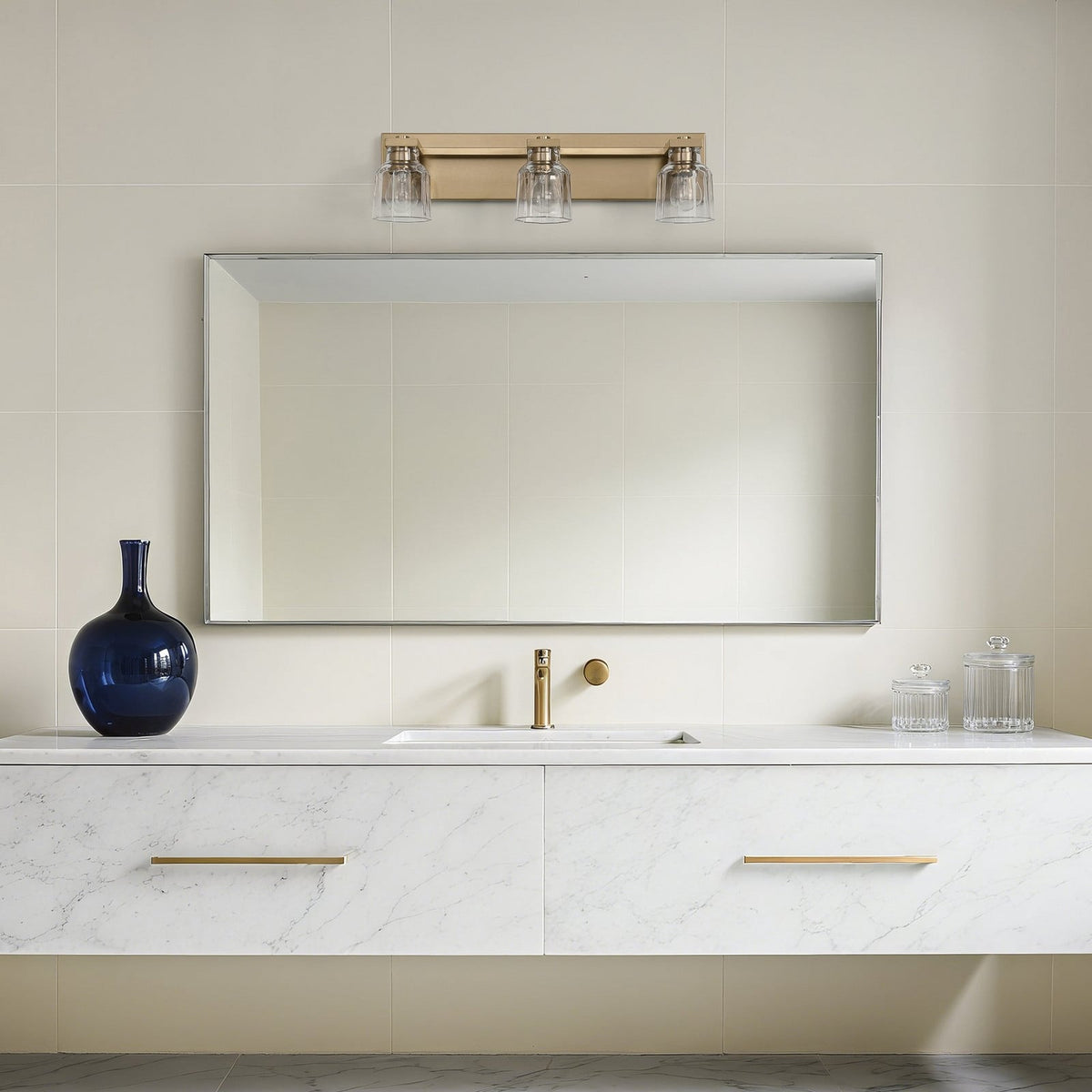 Thesis Dryden bathroom wall lamp, gold, 3-bulb, 24 in, metal/glass