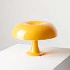 Artemide Nessino table lamp, yellow, 8 49/64 in plastic, E12