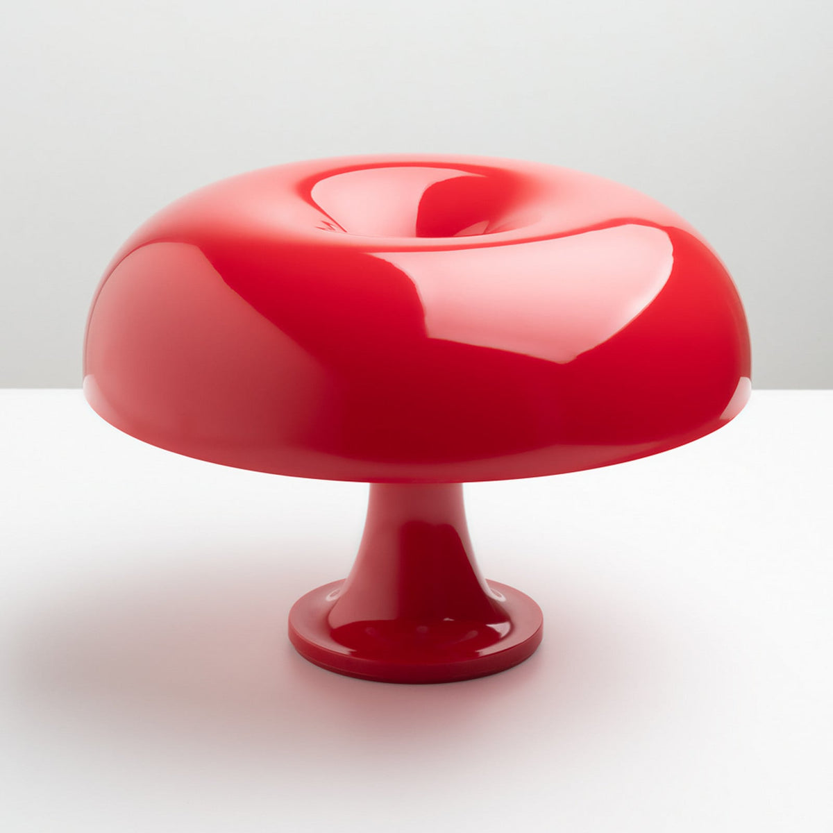 Artemide Nessino table lamp, red, 8 49/64 in, plastic, E12