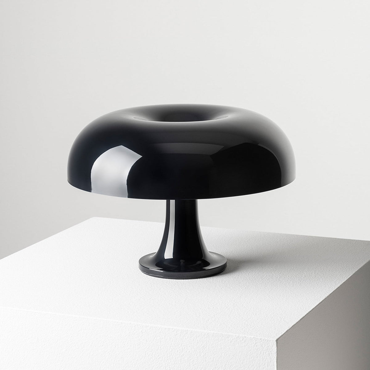 Artemide Nessino table lamp, black, 8 49/64 in, plastic