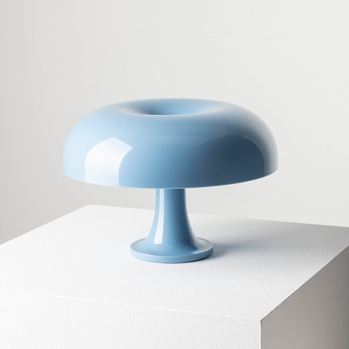 Artemide Nessino table lamp, light blue, 8 49/64, made of plastic