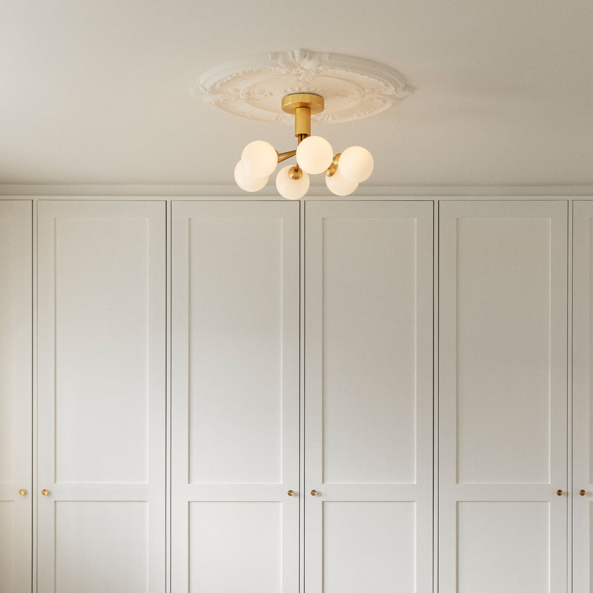 Nuura Apiales 6 ceiling light, brushed brass/opal, Ø 19.6 in