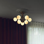 Nuura Apiales 9 ceiling light, brushed brass/opal, Ø 23.4 in