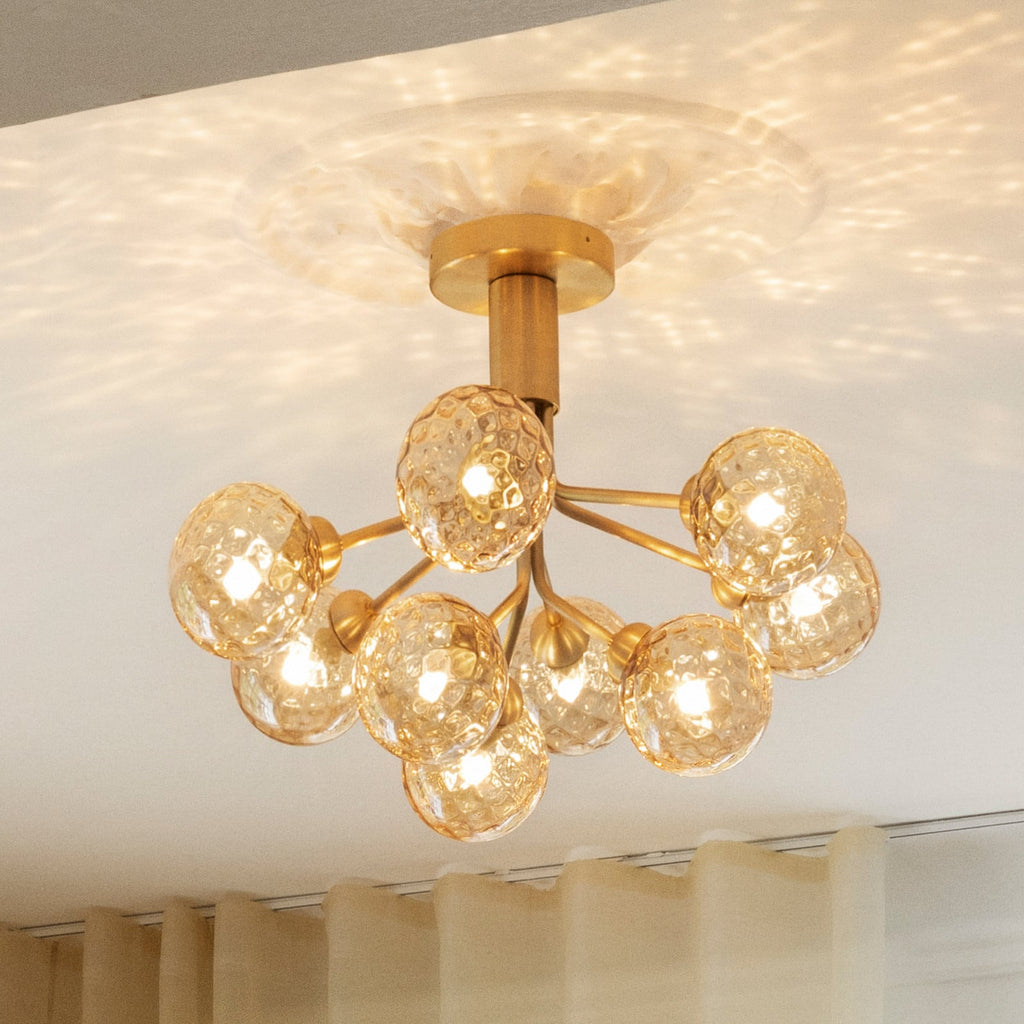 Nuura Apiales 9 ceiling lamp, brushed brass/optic gold, Ø23.4in