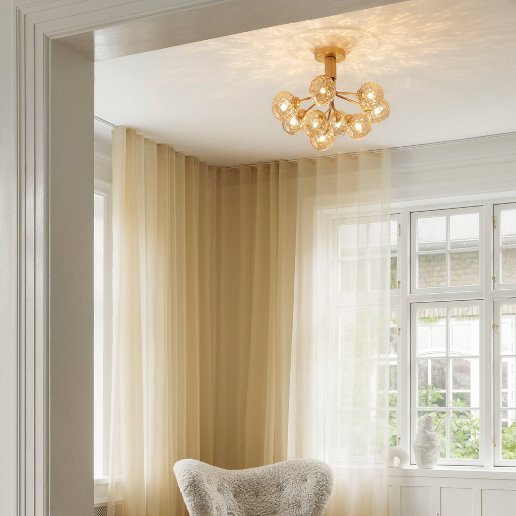 Nuura Apiales 9 ceiling lamp, brushed brass/optic gold, Ø23.4in