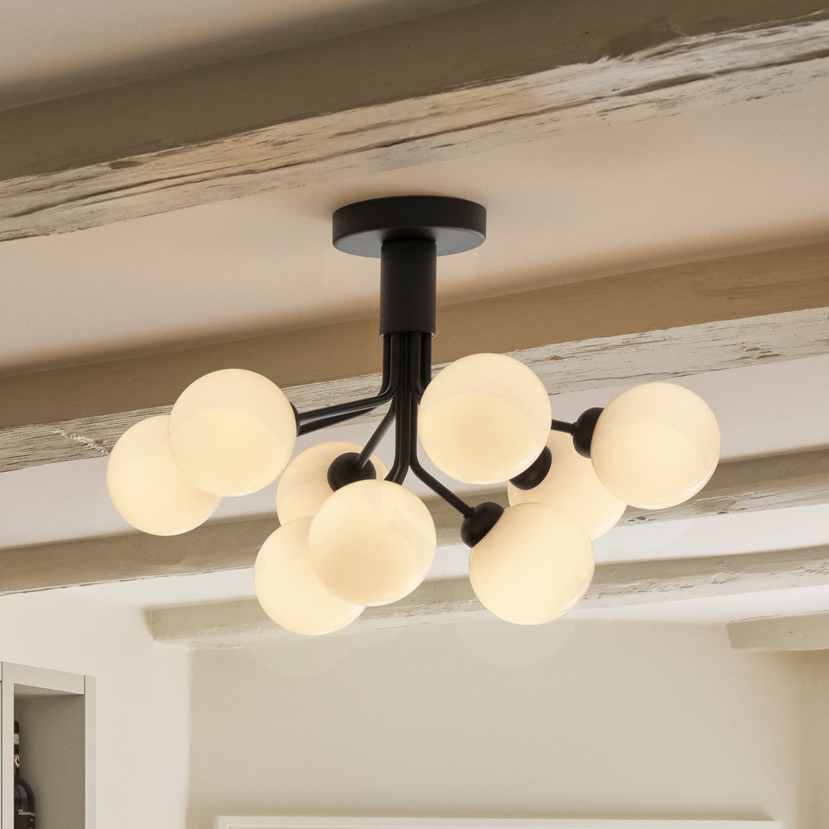 Nuura Apiales 9 ceiling light, satin black/opal, Ø 23.4 in