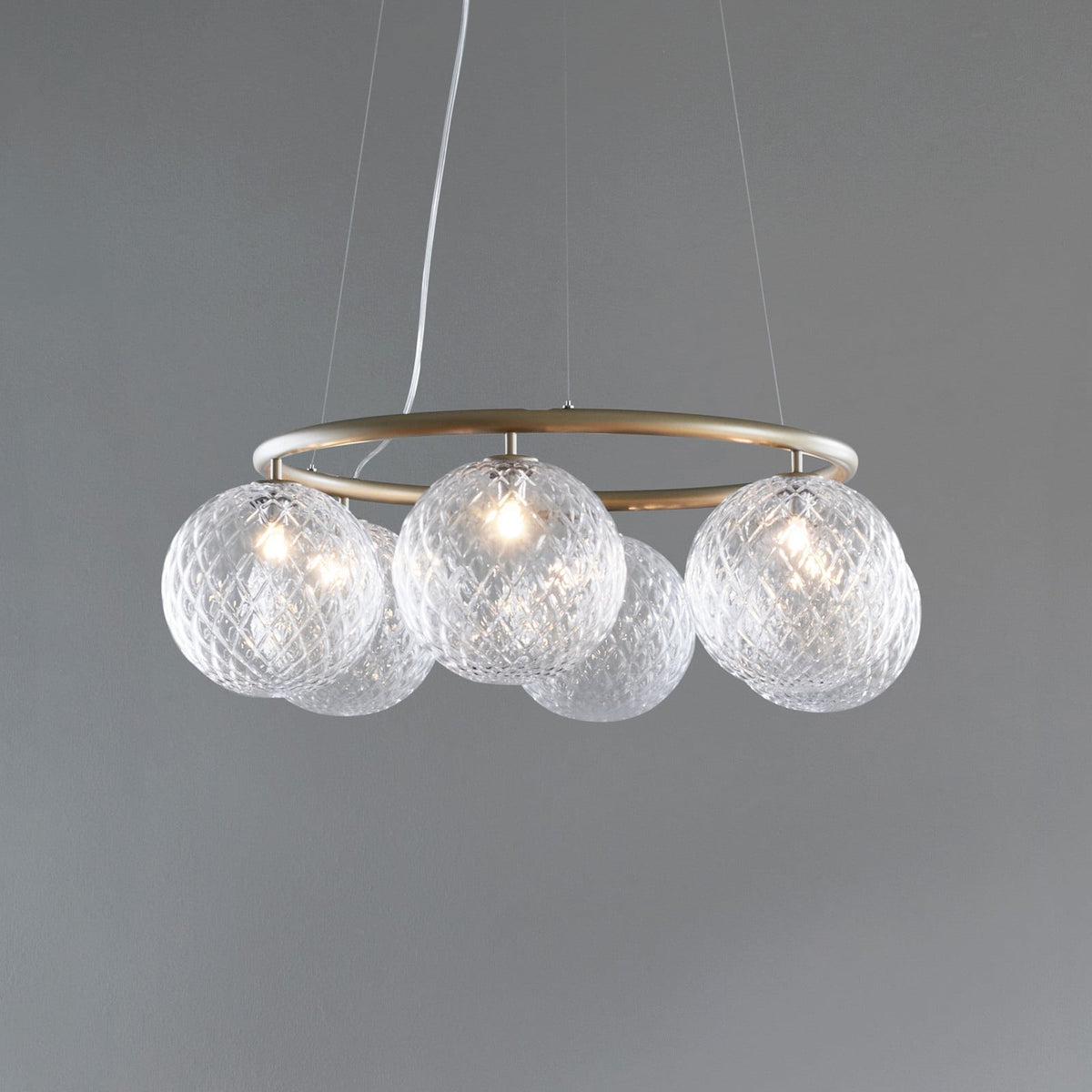 Nuura Miira 6 Circular hanging light, brass/clear glass, Ø 31.5in