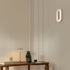 Nuura Sasi LED wall light, silver, 11.4 in, dimmable