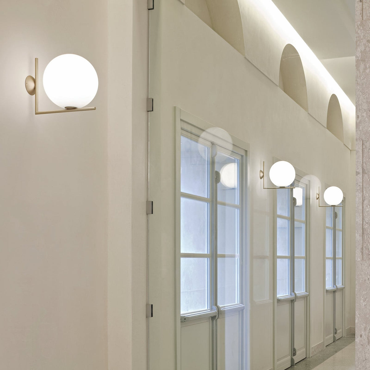 FLOS Ic C/W1 wall light, brass/white, glass, steel, G9